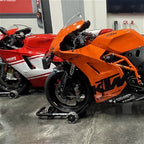 Multi-directional motorcycle stand — rider setup 01